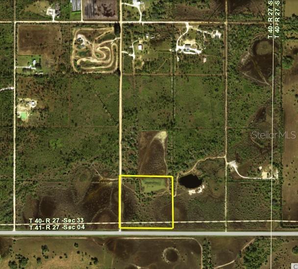 “The Cracker Camp" is a native 10 acre parcel in eastern Charlotte County fronting on SR74 and on Kelvin Avenue. Kelvin is a marl/dirt road that provides access along the west side of the property. The property is zoned Agriculture, a low-density zoning which permits many uses. This property can be "a place to just get away" and enjoy rural life. Currently there is a seasonal pond in the northeastern area of the 10 acres. The pond area appears to have been mined years ago…possibly when the roads were built when the subdivision was developed. The property demands you know and understand the nature of SW Florida during each season of the year as recreation and the agricultural, residential uses of the property would be based on adjusting to the season of the year and the uses permitted by government. A great side benefit to owning this property is access to the Babcock Ranch Preserve just 2.7 miles west of the property. Babcock Ranch Preserve provides over 67,000 acres of recreational state lands for nature lovers, hiking, hunting and horseback riding. Search Babcock Ranch Preserve for more details. In Golden Ranches there are opportunities for ATV’s, motor bikes in the area depending on the time of the year. The location provides the opportunity to see native wildlife, ride on your favorite off road vehicle or do whatever the season permits. Riding off road vehicles on the internal roads requires immense caution and safety considerations. Use of off road vehicles can require road repair if used improperly, Reason is that these roads are used by automobiles. This area offers peaceful surroundings where folks who desire the same lifestyle and relish the rural life. There are no sheds or buildings on the property, however the zoning of Agriculture will allow a pole barn, metal sheds and buildings. Being agriculture, no permits are needed to construct AG buildings to store or house equipment for the property. However, permits are needed when you install electricity and plumbing for electric service or a bathroom/kitchen. With a county permit, you could have your own pistol range. Elevation is at about 50 ft. There are no deed restrictions. This is in a vast 2 sq. mile area of small farms, ranchettes & undeveloped parcels owned by out-of-town or state owners. Limitations are prescribed by the AG zoning which permits all uses under the description including low density residential (1 home per parcel), conservation, agriculture, recreation and other uses consistent therewith. The purpose of the AG district is to provide areas for the establishment - continuation of agricultural type operations & uses…. accommodates those individuals who understand and desire to live in an agricultural environment of quiet privacy.