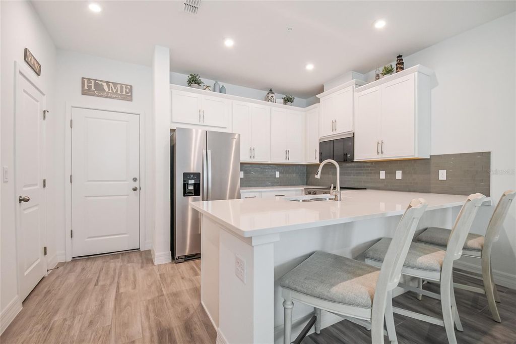 Photo of 9867 Walkway Drive, Orlando, FL 32832 (MLS # S5143073)