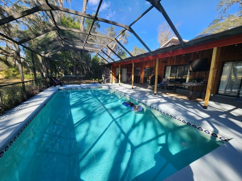 Photo of 34386 Whispering Oaks Boulevard, Dade City, FL 33523 (MLS # TB8444253)