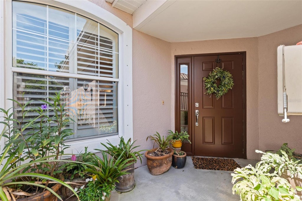 Photo of 2061 Carriage Lane #104, Clearwater, FL 33765 (MLS # TB8542702)