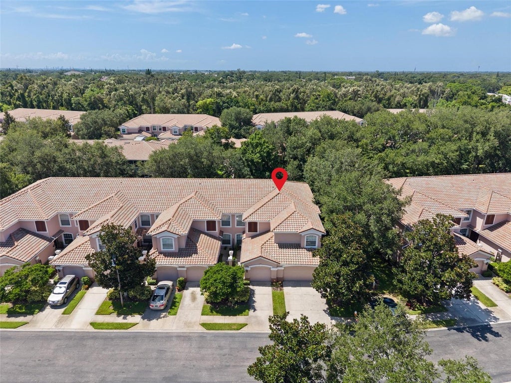 Photo of 2061 Carriage Lane #104, Clearwater, FL 33765 (MLS # TB8542702)