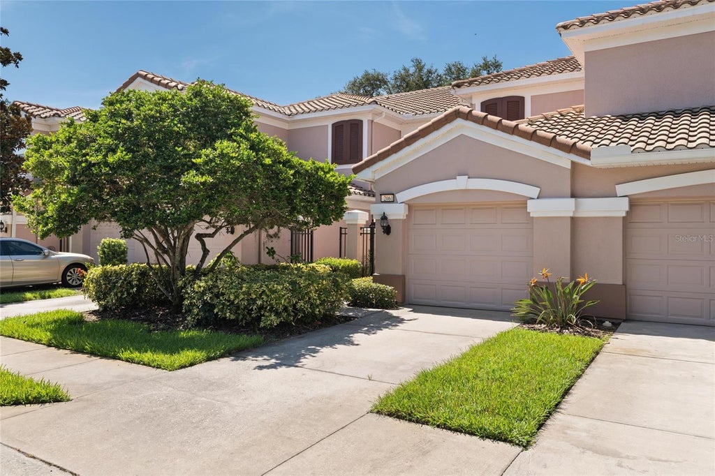 Photo of 2061 Carriage Lane #104, Clearwater, FL 33765 (MLS # TB8542702)