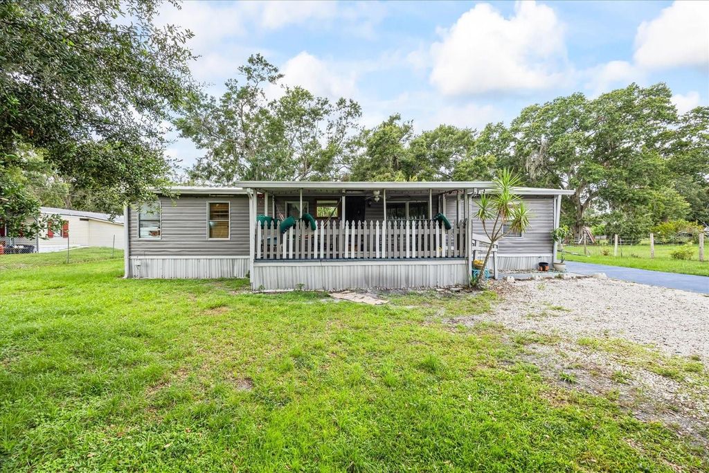 Photo of 6227 Springwoods Lane, Lakeland, FL 33811 (MLS # TB8423694)