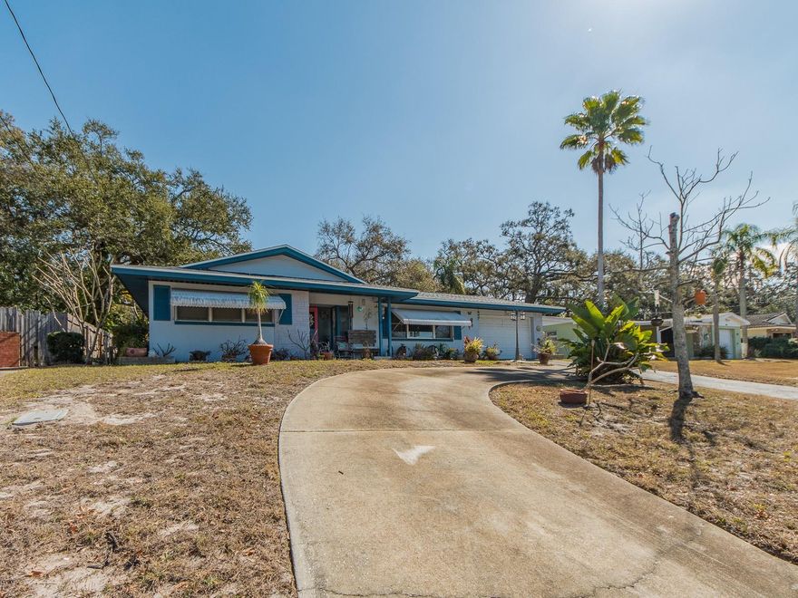 Location, convenience, and potential all come together in this well-situated 2-bedroom, 2-bath Largo home. Nestled on a quiet circular street, you’re just 5 minutes to the beach and 5 minutes from Largo’s exciting redevelopment districts, giving you the best of coastal living and city access.
Sitting high on an oversized lot, the property features a circular driveway, an extra-large 1.5-car garage, a new roof (2024), and newer A/C, offering a solid foundation for your personal updates.
Inside, enjoy a spacious, functional layout with two comfortable bedrooms, two full baths, a large galley-style kitchen with eat-in space and pantry, an L-shaped living/dining room, and a warm, inviting family room that opens to an expansive screened porch—perfect for year-round outdoor living.
Priced to reflect cosmetic updates, this home gives you the opportunity to renovate to your taste without sacrificing equity. Shopping, dining, and everyday conveniences are all just minutes away.