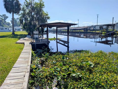 Photo of 25836 Manhattan Lane, Astor, FL 32102 (MLS # R4911060)