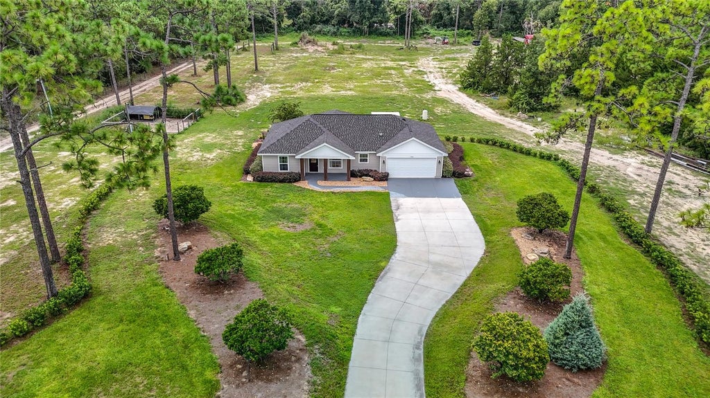 Photo of 15204 Ganster Drive, Brooksville, FL 34613 (MLS # OM724224)