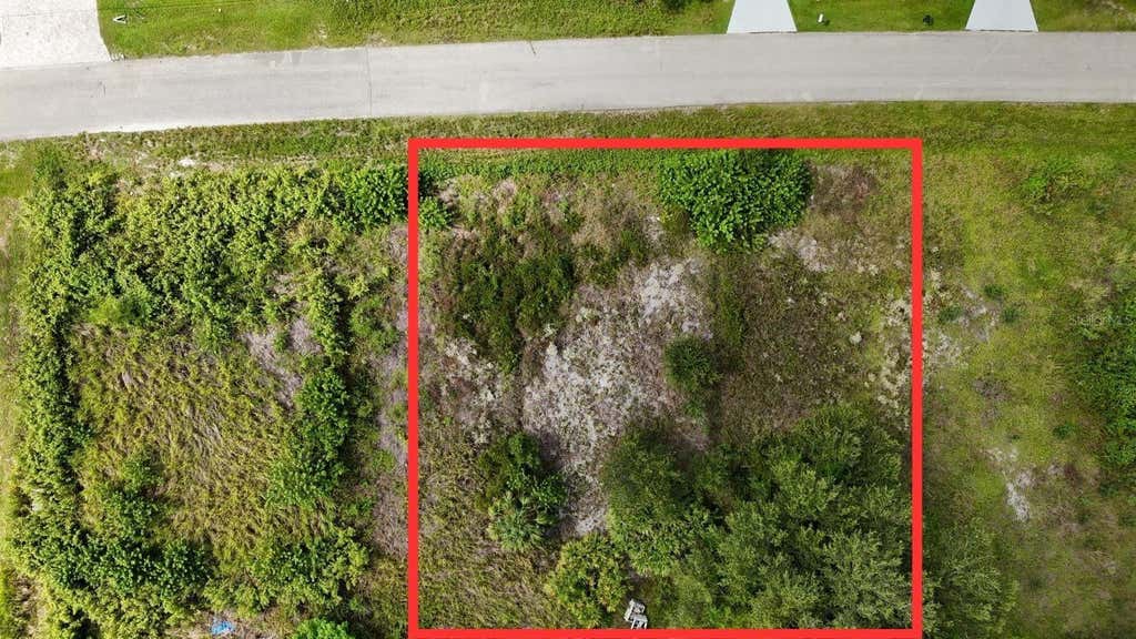 Photo of 4452 28th Street SW, Lehigh Acres, FL 33973 (MLS # GC542121)