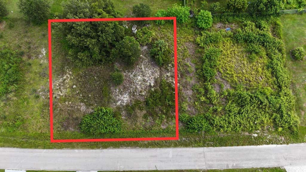 Photo of 4452 28th Street SW, Lehigh Acres, FL 33973 (MLS # GC542121)