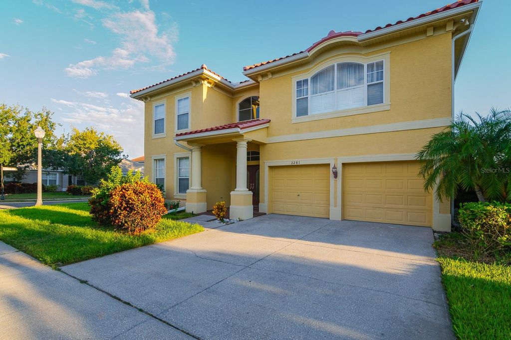 Photo of 2281 Highland Woods Drive, Dunedin, FL 34698 (MLS # TB8431000)