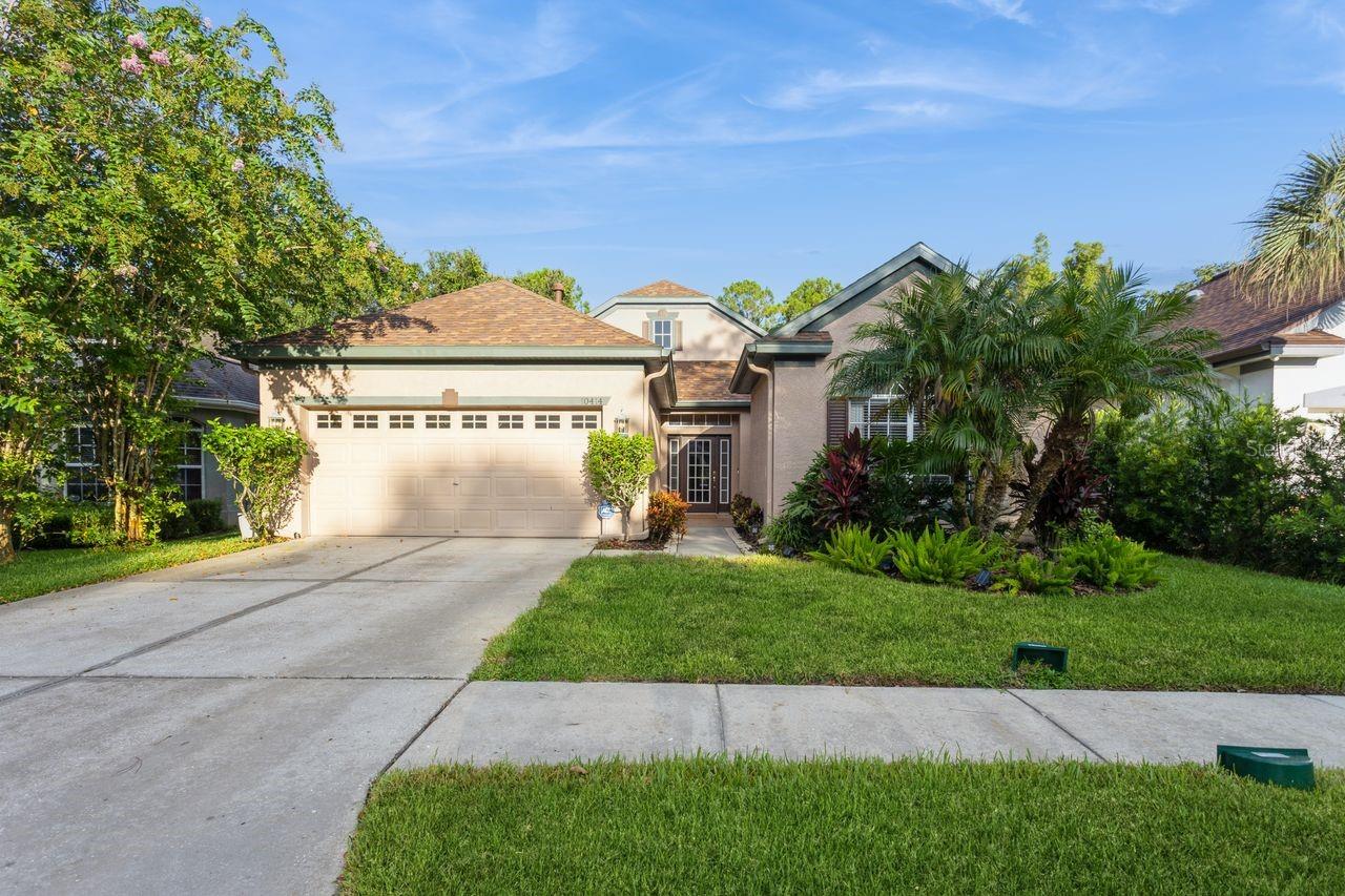 Welcome to this beautiful single-family pool home, ideally located in the 24-hour guard-gated GREENS community of Westchase. Built by Ryland Homes, this well-maintained residence offers 4 bedrooms, 2.5 bathrooms, and a 2-car garage, all situated on a peaceful conservation lot.
Step inside to discover an open floor plan filled with natural light, featuring a formal living room and a formal dining room-perfect for entertaining guests. The spacious kitchen opens to a cozy family room with a gas fireplace and large windows showcasing serene views of the screened lanai, pool and heated spa, all overlooking the conservation area.
A dedicated laundry room with washer and dryer adds convenience while a built-in desk area near the kitchen provides a great space for work or study.
Recent upgrades include; A brand-new roof (May 2025), a brand-new water heater (May 2025), a newer pool heater (2024) and a newer A/C system (2023).