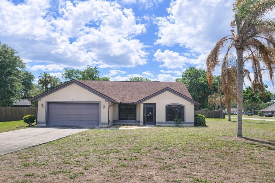 WATER ENTHUSIASTS COME TOUR THIS HOME!!! HARRIS CHAIN OF LAKE ACCESS (Lake Griffin) is granted by a community paved boat ramp for water activities like fishing, boating, kayaking, etc. This is a very desirable 4-bedroom, 2-bath home offering 1,983 square feet of comfortable living space. A versatile den/formal living room or office offers the perfect spot for working from home, studying, or creating a cozy flex space.  Please view the 3D virtual tour which shows the floor plan! T his home is perfectly situated on almost a half an acre corner lot and there is NO HOA!    Built in 1997, this home features a popular split-bedroom layout that provides privacy and functionality for everyday living.The open floor plan connects the main living areas, creating a bright and inviting space ideal for both relaxing and entertaining. Owner's suite has an en-suite with a soaking tub, separate shower, walk-in closet and there are sliders leading out to the lanai. Enjoy Florida living year-round in the screened, enclosed lanai overlooking the yard—ideal for morning coffee or evening gatherings. The property also includes a shed for additional storage.   Roof replaced in 2013 and re-piping in 2016. New carpet installed!  This home is ready to meet a variety of lifestyle needs. Don’t miss the opportunity to make it yours.