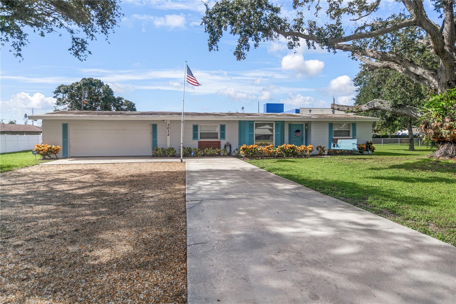 Welcome to 3012 52nd Avenue Drive W in beautiful Bradenton, Florida! This solid concrete block home sits proudly on a double lot .47 acres, with the residence thoughtfully centered to maximize front, side and backyard space—perfect for gardening, play, or future outdoor projects. Inside, you’ll find a home that has been lovingly maintained by its original owners since it was built, offering peace of mind and timeless care. The property features a true two-car garage with plenty of room for parking, storage, or even a workshop for your hobbies. Step out back to enjoy the screened-in patio lanai, ideal for morning coffee, evening gatherings, or relaxing in the Florida breeze. The location couldn’t be more convenient—tucked in the heart of Bradenton, you’ll have easy access to shopping, dining, and everyday essentials while being just a short drive to the world-renowned Gulf beaches of Anna Maria Island. This home offers a rare combination of quality construction, generous lot size, and unbeatable location, and most importantly NO HOA—all in a property that has pride of ownership from one family in its lifetime! 4-Point Inspection report available upon request