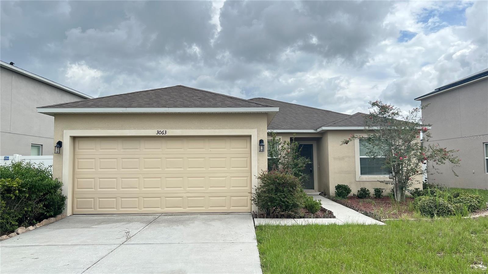 Enjoy this cozy 4-bedroom 2Bth single-family home. Nice-sized kitchen area that has a dining nook attached. There is a split floor plan for privacy, along with the living room. The primary bathroom has dual vanity sinks and a walk-in shower. All appliances included, and an attached two-car garage, the home is approximately 1501 sq. ft of living space. **NEW PICTURES**
The house is located in the Patterson Groves Community in Haines City. Only minutes from the I-4 and US-27 intersection, providing easy access to many places. This community is in close proximity to many stores, restaurants, and entertainment for your family.