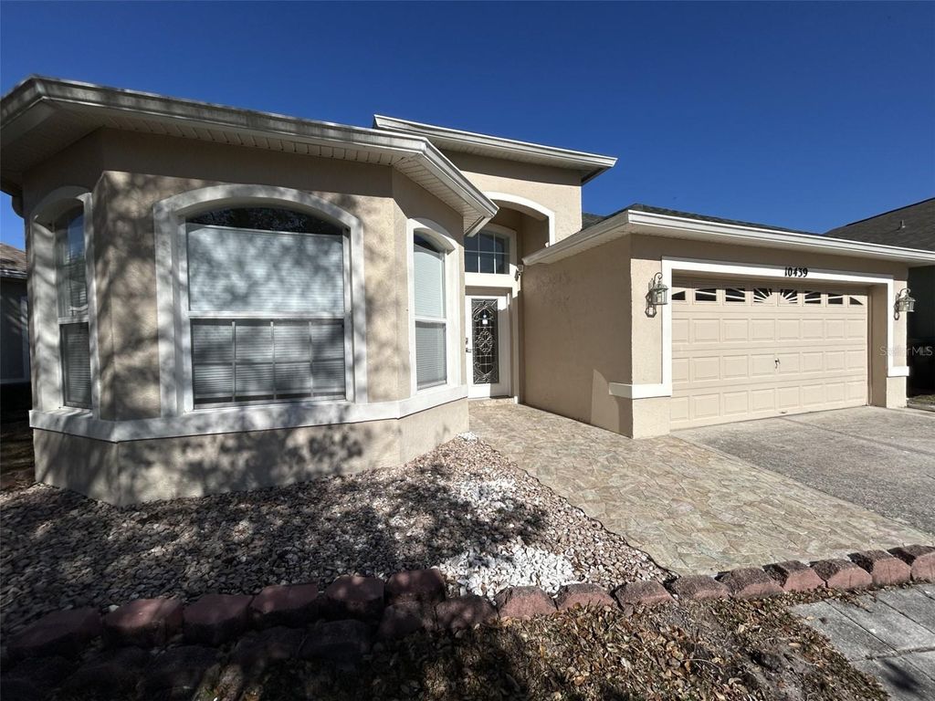 Photo of 10439 Andover Point Circle, Orlando, FL 32825 (MLS # B4902172)