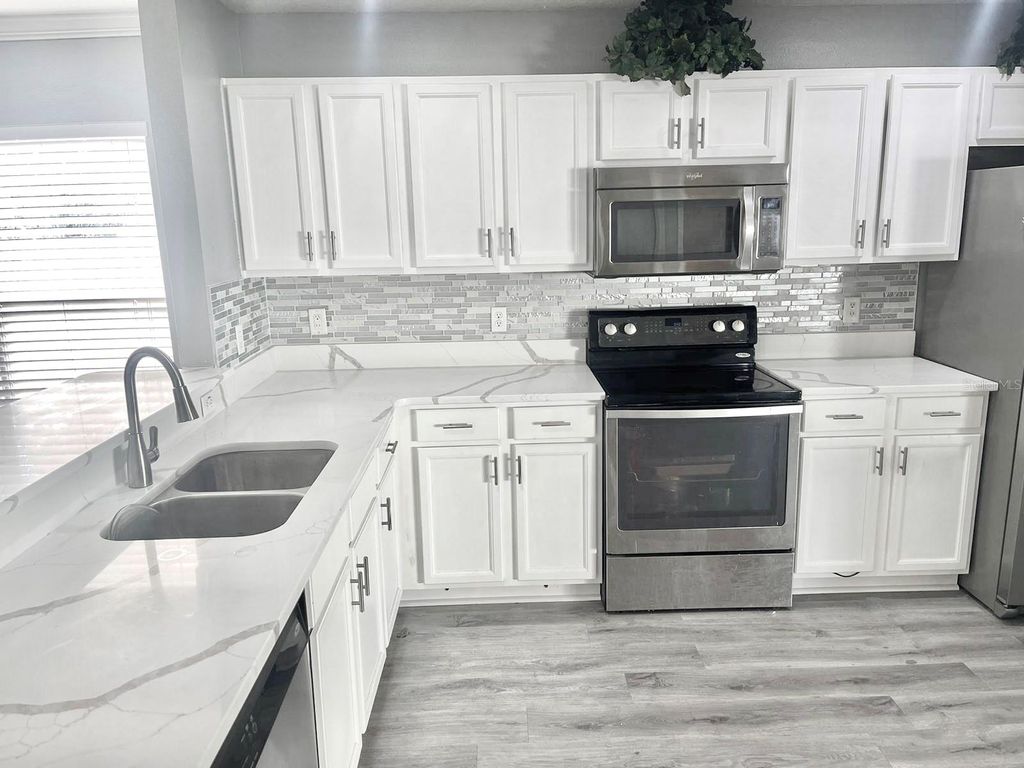 Photo of 501 Flower Fields Lane, Orlando, FL 32824 (MLS # S5140241)