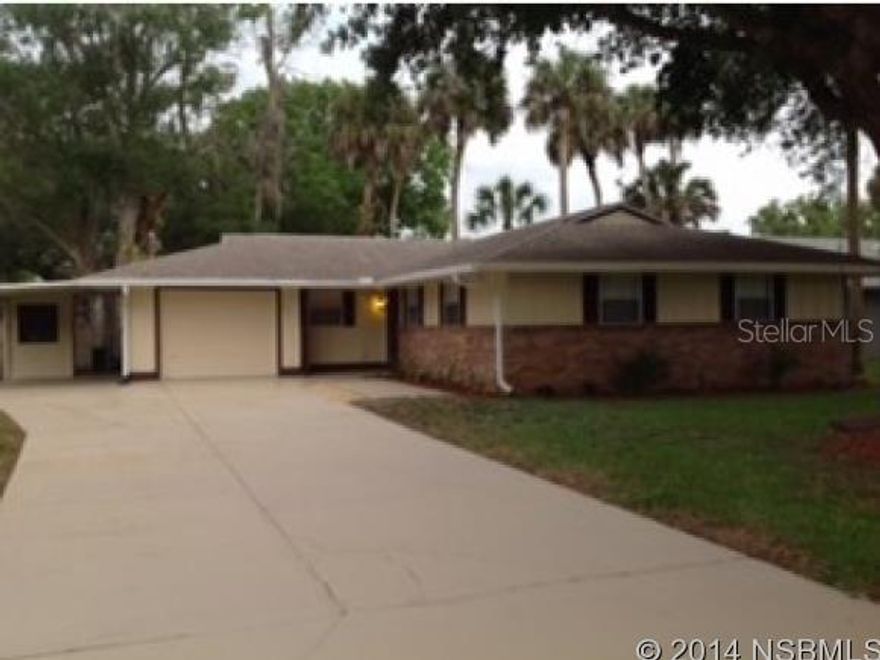 This 4/2, 1 Car Garage/1 attached carport/ is on a corner lot with 1702 sq ft under air, has been completely renovated with New Kitchen Cabinets, Newer Appliances, New Bathrooms, New Blinds, New interior and exterior paint and Landscaping. Located off US1 and Wayne Ave, walking distance to NSB Municipal Golf Course. Close to shopping and restaurants and only a couples of miles to beachside and/or Flagler Ave. Just 45 minutes to downtown Orlando.  COME CHECK IT OUT! ;Water: City
