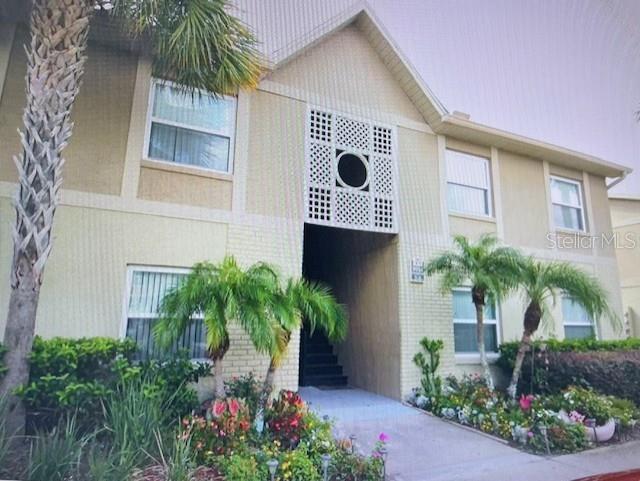 Photo of 2409 Barley Club Dre. Dr #4, Orlando, FL 32837 (MLS # O6444945)