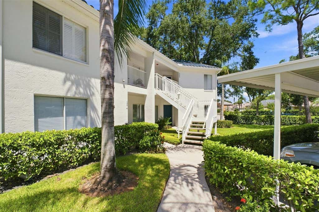 Photo of 3588 Indigo Pond Drive #12, Palm Harbor, FL 34685 (MLS # TB8538204)