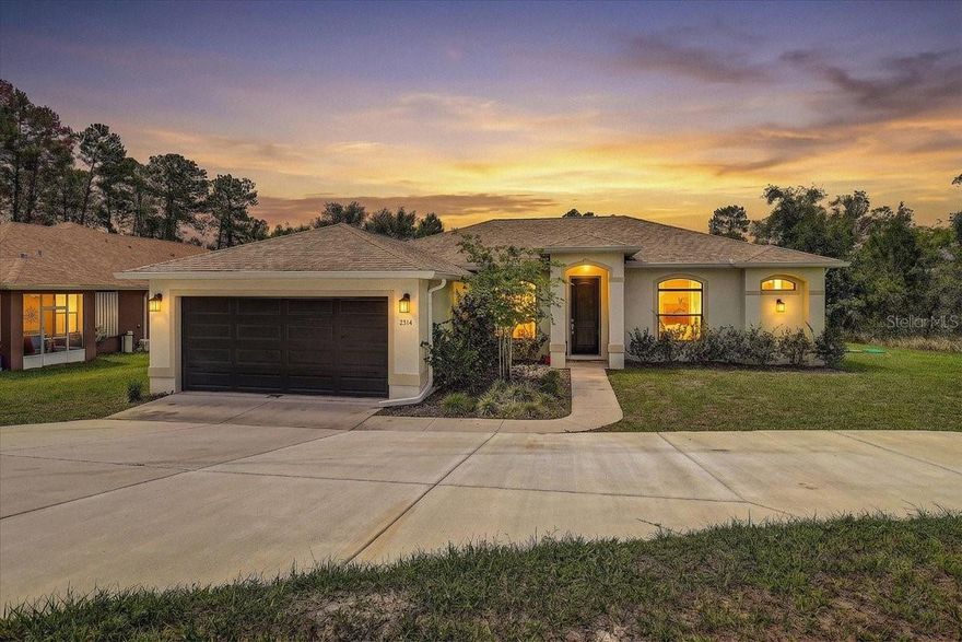 Welcome to this beautifully maintained 2023-built home situated on a high and dry .46-acre lot offering privacy, space, and modern comfort! Featuring 3 bedrooms, 2 bathrooms, an open and split-bedroom floorplan, this home was designed for both everyday living and entertaining. The circular driveway, added in 2023, provides added convenience, extra parking space, and great curb appeal. Step inside to find high ceilings, abundant natural light, and laminate flooring throughout the main living areas with carpet in the bedrooms. The spacious living room welcomes you as you enter, while an additional family room just off the kitchen creates the perfect setup for gatherings and relaxing evenings. The kitchen features granite countertops, stainless steel appliances, extensive cabinet space, and a dinette area overlooking the family room so you can enjoy meals while staying connected. The primary bathroom offers granite countertops and a beautifully tiled shower, while the guest bathroom also includes granite countertops and a tiled shower. Inside laundry room comes complete with washer and dryer. Sliding glass doors lead out to the oversized outdoor deck built this year, creating the perfect outdoor entertaining space. The backyard also includes a 12x24 shed for additional storage. Enjoy added privacy with no rear neighbors behind the home and an empty lot next door. Located just 5 minutes from Weeki Wachee Springs State Park where you can enjoy kayaking, paddleboarding, swimming, boating, hiking trails, river cruises, Buccaneer Bay water park, and the famous live mermaid shows. Nearby attractions also include Rogers Park for swimming, tubing, kayaking, and seasonal manatee sightings, Pine Island Beach Park for Gulf sunsets and fishing, Bayport Park & Boat Ramp for boating and kayaking, and Delta Woods Park for sports and recreation. Pine Island Beach is only about 15 minutes away, giving you quick access to the Gulf Coast lifestyle. Conveniently located near Weeki Wachee Village Shopping Center, Coastal Landing Shopping Center, Publix, Walmart Supercenter, Target, Aldi, Sam’s Club, Lowe’s, Home Depot, TJ Maxx, Bealls, and Ross, with most major shopping and dining located along the US-19/Commercial Way corridor in Spring Hill. Enjoy easy access to Hernando Beach waterfront restaurants, local seafood spots, live music venues, mini golf, bars, and endless outdoor recreation. This home is also USDA eligible, allowing qualified buyers the opportunity for 100% financing with no money down, making it an exceptional opportunity for both primary residence buyers and those seeking affordability in a highly desirable area.This location offers the perfect balance of peaceful residential living while still being close to everyday conveniences, Gulf access, shopping, restaurants, and some of Florida’s best outdoor attractions. Whether you’re looking for a full-time residence, vacation getaway, or investment opportunity, this home puts you right in the heart of Florida’s Nature Coast lifestyle.