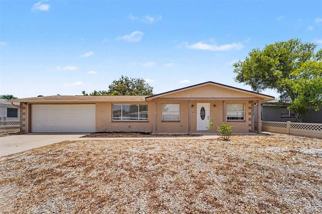 Photo of 3344 Trask Drive, Holiday, FL 34691 (MLS # O6424890)