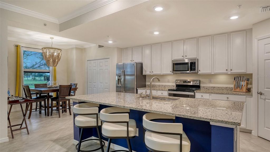 Photo of 5710 Palmer Circle #103, Bradenton, FL 34211 (MLS # A4665678)