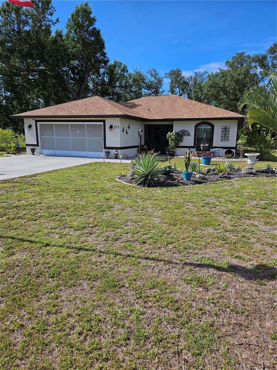 Photo of 277 Albatross Road, Rotonda West, FL 33947 (MLS # C7527030)