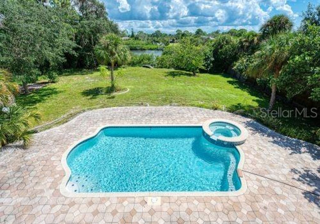 Photo of 1648 Bayshore Drive, Englewood, FL 34223 (MLS # D6144261)