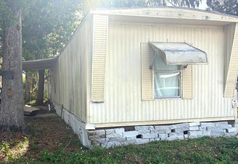 Photo of 61 Golden Gate Circle, Port Orange, FL 32129 (MLS # NS1087859)