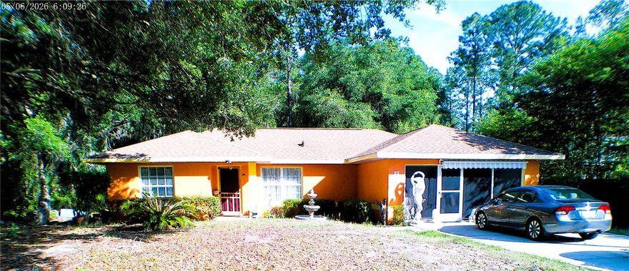 *NEW FLOORING COMING SOON!* Welcome to your new oasis in Ocklawaha! This charming 3-bedroom, 2-bathroom home sits on a .23-acre lot, offering a perfect blend of comfort and nature. The property boasts a stunning 30x10 elite screened-in room, completed in January 2023, ideal for relaxing and entertaining while enjoying the peaceful surroundings.
Recent upgrades include a new roof installed in October 2022, providing peace of mind for years to come. Painted galvanized corrugated metal fence on both sides of home w/gates that will last 25-50 years. This delightful home is nestled between the serene Ocklawaha River and beautiful Lake Pendarvis, making it a perfect spot for nature lovers and outdoor enthusiasts alike.
Additionally, the owner has two other lots for sale, one located directly across the street, providing an excellent opportunity for expansion or investment.MLS#OM74061 and a .47 corner lot around the corner. MLS#OM724345
Located just 3 miles west of Ocala Forest, you’ll find yourself surrounded by countless recreational activities, including hunting, fishing, horseback riding, four wheeling and exploring multiple nearby crystal clear springs.