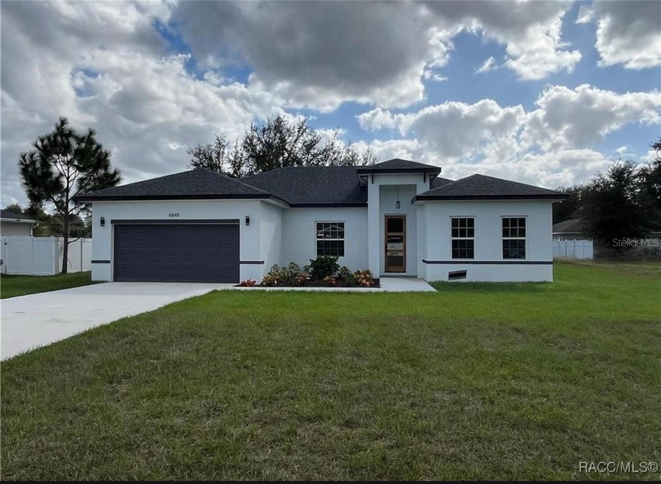One or more photo(s) has been virtually staged. Spacious 4-bedroom, 2-bath home in a quiet Citrus Springs neighborhood. Open floor plan, modern kitchen, and plenty of natural light. Master suite with walk-in closet and private bath. Large backyard, perfect for relaxing or entertaining