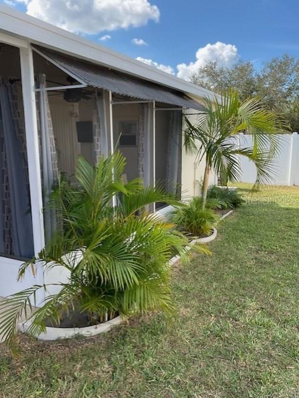 Photo of 72 Pindo Palm Street W, Largo, FL 33770 (MLS # TB8464330)