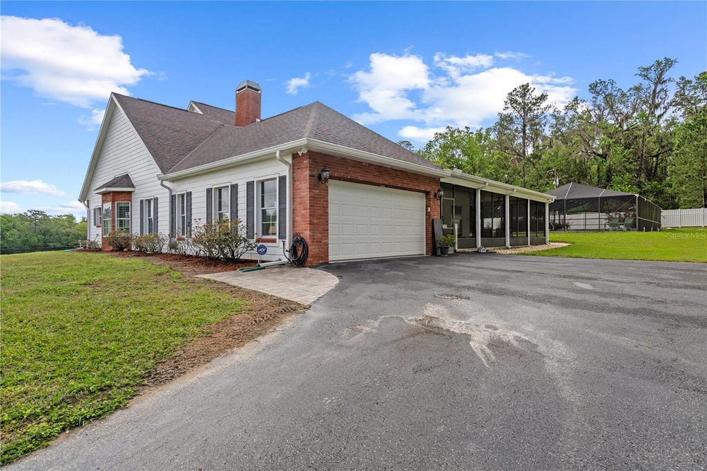 Photo of 12345 Citrus Way, Brooksville, FL 34601 (MLS # TB8463080)