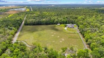 THAT PART OF SW1/2 OF NW1/4 OF NW1/4 LYING W OF SR - Residential