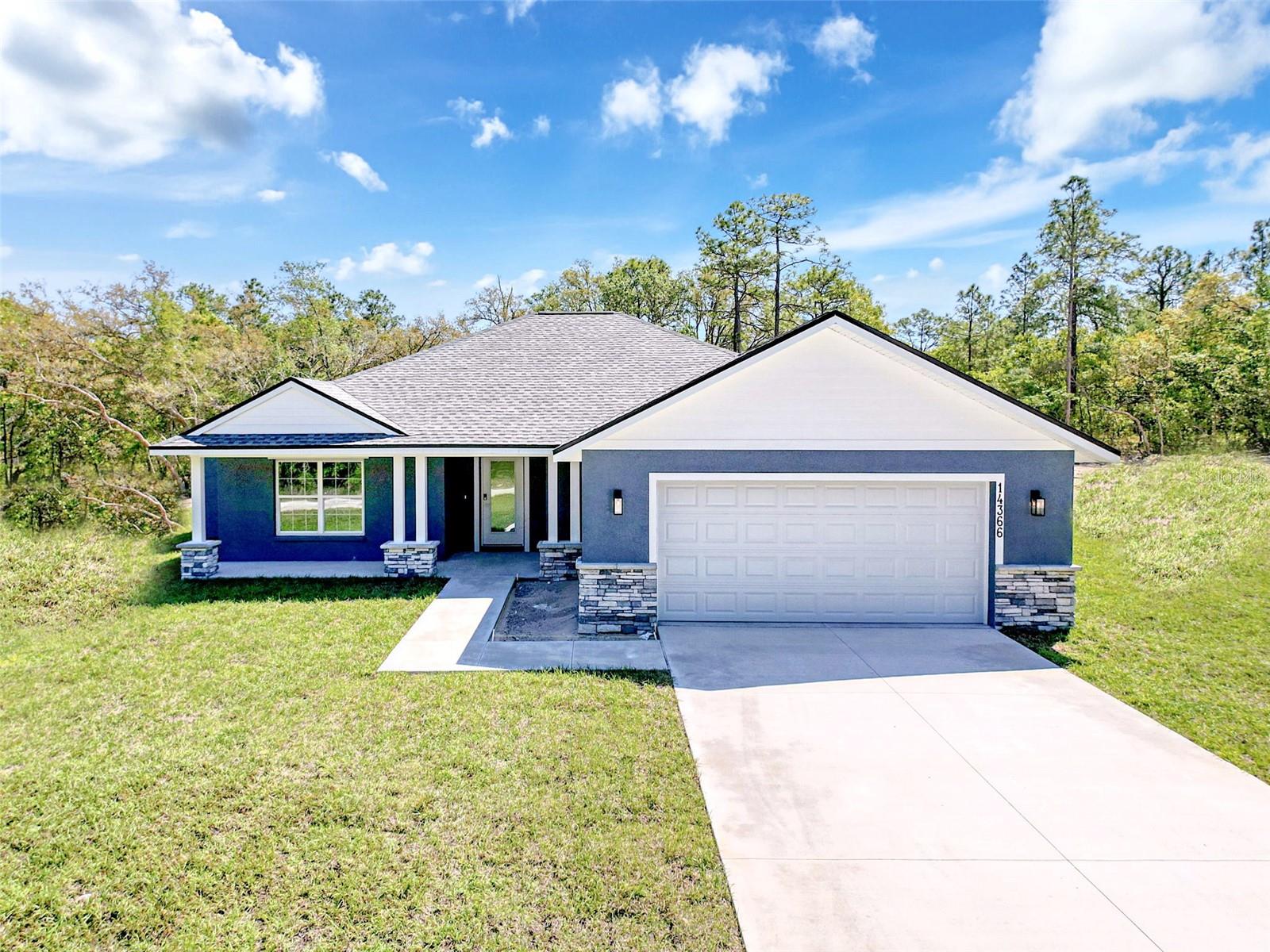 Under Construction. BRAND-NEW + BUILT FOR THE WAY YOU LIVE — HALF-ACRE LOT, NO HOA, AND READY AUGUST 15! Welcome to 11230 Osprey Avenue, Weeki Wachee — a 2025-BUILT HOME that gives you all the space, STYLE, and FREEDOM you've been looking for! This 3-BEDROOM, 2-BATHROOM, 2-CAR GARAGE HOME is tucked away on a SPRAWLING ½ ACRE LOT on a PAVED ROAD, with NO HOA, NO CDD, and NO FLOOD ZONE — giving you room to live your way, without restrictions. Set to be COMPLETED BY AUGUST 15, this home offers 1,682 SQUARE FEET OF LIVING SPACE and 2,457 SQUARE FEET UNDER ROOF — plus a BUILDER'S 1-YEAR HOME WARRANTY for added peace of mind. And the best part? A COMPLETED MODEL IS AVAILABLE TO VIEW NOW, so you don't have to wait to see the FINISHES in person! This is NOT YOUR AVERAGE FLOOR PLAN. Inside, you'll find PREMIUM FINISHES throughout, including LUXURY VINYL PLANK FLOORING, TALL BASEBOARDS, and an OPEN LAYOUT with just the right balance of cozy and functional. The CHEF-STYLE KITCHEN is a total standout, featuring WHITE SHAKER CABINETS, QUARTZ COUNTERTOPS, a CENTER ISLAND, FULL APPLIANCE PACKAGE, and a MASSIVE WALK-IN PANTRY that you'll fall in love with. Right off the garage, you'll find a MUDROOM and an INSIDE LAUNDRY ROOM with a WINDOW, STORAGE CABINETS, and a FOLDING STATION — giving you EVERYDAY CONVENIENCES you won't find in other new builds. The PRIMARY SUITE is tucked away for privacy and offers HIS-AND-HERS WALK-IN CLOSETS, DUAL SINKS, and a sleek WALK-IN SHOWER. Both guest bedrooms have modern finishes and great natural light. Out back, the COVERED LANAI gives you space to RELAX and take in the PRIVACY of your LARGE LOT — whether you're planning a GARDEN, a PLAY AREA, or just want some BREATHING ROOM. ZONED FOR WINDING WATERS K-8 AND WEEKI WACHEE HIGH SCHOOL, and just minutes to SPRING HILL, BROOKSVILLE, CITRUS COUNTY, WEEKI WACHEE SPRINGS, and area BOAT RAMPS — this location gives you the BEST OF EVERYTHING, without the hustle and bustle.
NEW CONSTRUCTION WITH ALL THE UPGRADES plus LAND TO SPREAD OUT. YOU WILL WANT TO SEE THIS ONE IN PERSON.