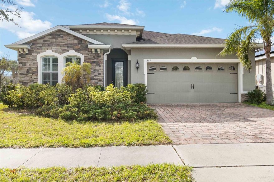 This beautifully maintained home sits on a premium corner lot in the highly sought-after ChampionsGate area, offering the perfect blend of style, comfort, and convenience.  Designed with accessibility in mind, the home features a bright, open floor plan ideal for both everyday living and entertaining. 
The home offers a well-designed split 3-bedroom floor plan that provides privacy and versatility. The primary suite is thoughtfully separated from the secondary bedrooms, creating an ideal layout for family living or hosting guests.  At the heart of the home is an inviting open-concept living space that flows effortlessly between the living and dining areas and into the kitchen. The kitchen is a true centerpiece, featuring a huge island with granite countertops, stainless steel appliances, walk-in pantry and ample workspace—perfect for entertaining or everyday meals. A dedicated office adds flexibility for remote work, a study, or a quiet retreat.  Completing the home is a spacious 2-car garage and a convenient in-home laundry room, ensuring functionality and comfort throughout. This thoughtfully planned layout blends modern design with practical living, making it both stylish and highly livable.
Enjoy Florida’s indoor-outdoor lifestyle from the spacious screened lanai, perfect for relaxing or hosting guests year-round. Solar panels add energy efficiency and long-term cost savings, enhancing the home’s modern appeal.  Situated near championship golf courses, shopping, dining, Disney and major highways, this desirable community offers exceptional access to everything ChampionsGate has.Whether as a primary residence or a Florida retreat, this move-in-ready home delivers comfort, accessibility, and value in one of Davenport’s most popular locations.