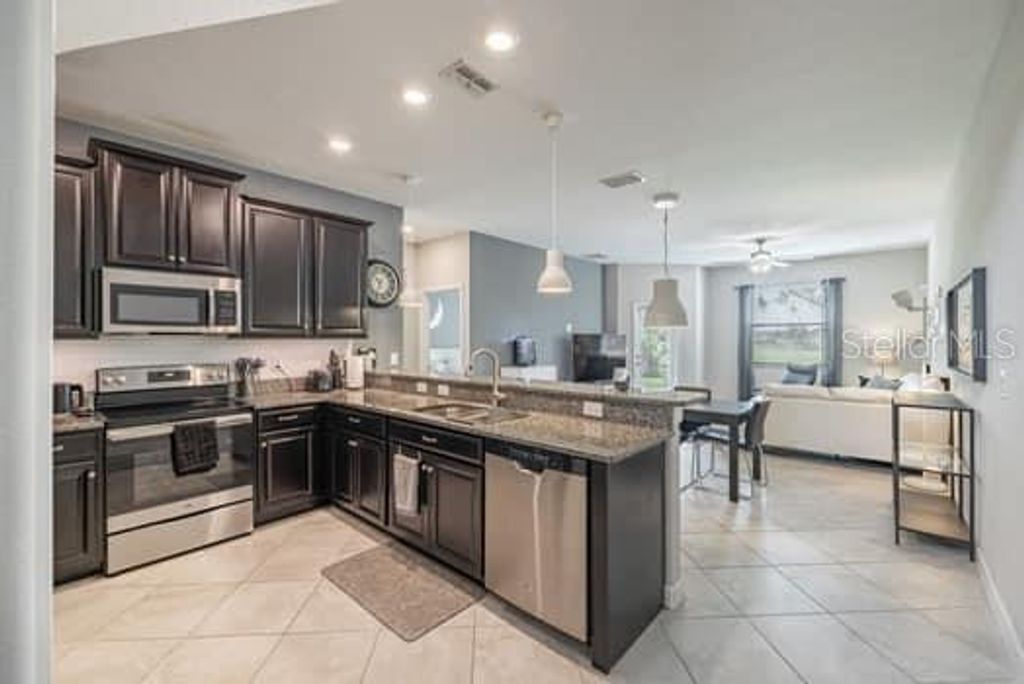 Photo of 28504 Tranquil Lake Circle, Wesley Chapel, FL 33543 (MLS # TB8396462)