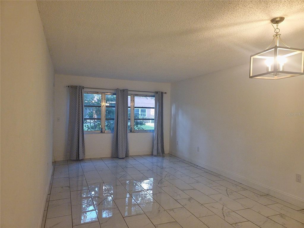 Photo of 4805 Alt 19 #215, Palm Harbor, FL 34683 (MLS # TB8454674)