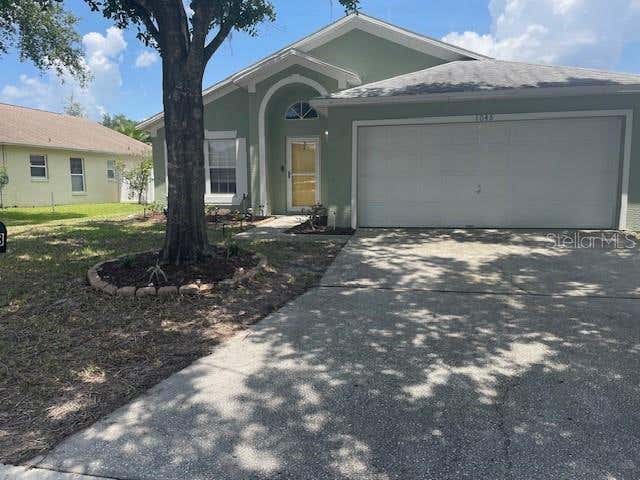 Photo of 1048 Winding Water Way, Clermont, FL 34714 (MLS # OM729077)