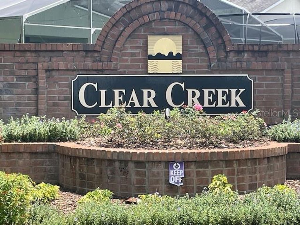 Photo of 1048 Winding Water Way, Clermont, FL 34714 (MLS # OM729077)