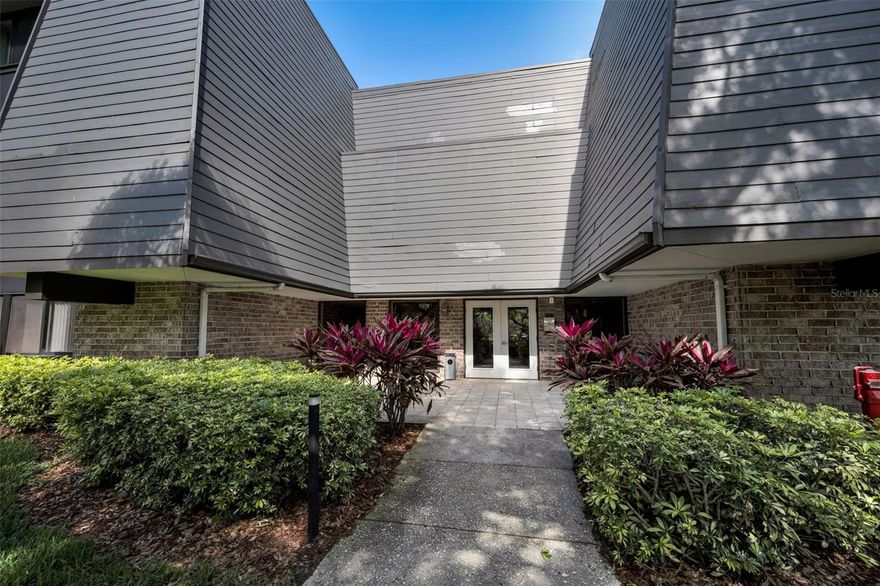 Welcome to this spacious condo offering a variety of wonderful features. The condo is located in the Troon building, one of the communities sought-after permanent buildings, known for its unique features and desirable amenities. 
The building provides under-the-building, shared parking garage with two parking spaces. In addition, there are two extra-large locked storage areas, perfect for bikes, holiday décor, furniture or anything else you need to store. Step into your buildings ELEVATOR to go to the second floor which is convenient for groceries, etc. 
The home includes a convenient laundry room with a built-in desk, perfect for crafts or a work-from -home space. Recessed downlighting throughout making the unit light and bright. Step outside and enjoy the large wrap-around patio, ideal for relaxing or entertaining. The layout includes 2 bedrooms, 2 bathrooms, and a den that can also be used as an office, hobby room, additional living space or convert it into a third bedroom. The primary suite features a large walk-in closet and additional closet for storage. The primary bathroom offers a spacious walk-in shower with a built in seat and an additional linen closet. There is plenty of space for family and friends to relax. Enjoy your morning coffee on the wrap-around patio with NEWER Pella hurricane proof sliding doors, then stroll to the Salamander Grill/Osprey clubhouse  for a delicious meal, or stop by Fairway's coffee shop for your favorite Starbucks treat. The Lockness Pool-perfect for a relaxing afternoon swim and poolside bites-is a pleasant walk away, while Packard's steakhouse offers an exceptional fine-dining experience right on the resort grounds. For wellness and pampering, the Fitness center and Salamander spa are close by. Innisbrook, home of the Valspar PGA Championship, is celebrated for its world-class amenities, including 4 golf courses, 4 restaurants, 6 pools, tennis courts, Pickleball, Full-service spa and fitness center, Playground and miniature golf course. Location, location, location! conveniently located just 23 miles from Tampa international airport, approximately 15 miles from award-winning Clearwater beach, and close to the charming communities of Dunedin, Tarpon Springs, and St. Petersburg. Come experience the exceptional beauty, amenities, and effortless lifestyle of Innisbrook living.