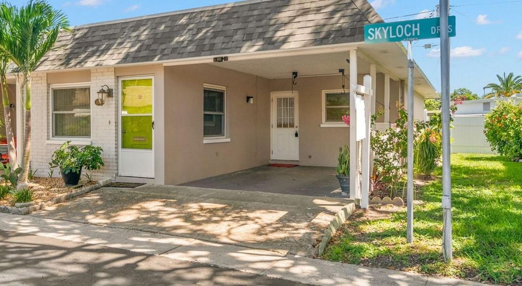 Photo of 883 Sky Loch Drive S, Dunedin, FL 34698 (MLS # TB8410266)