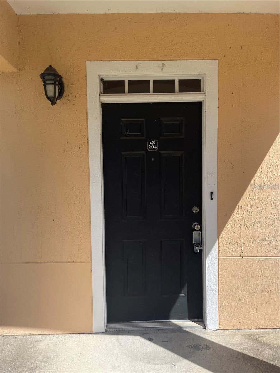 Photo of 3301 Soho Street #204, Orlando, FL 32835 (MLS # O6436583)