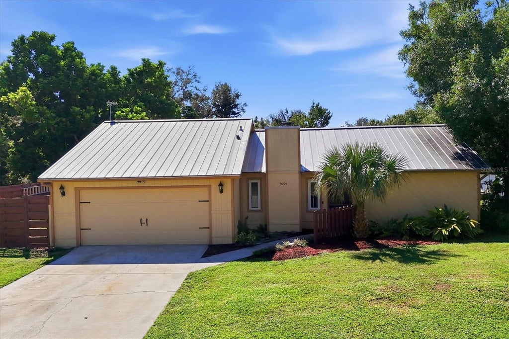 Photo of 4006 75th Terrace E, Sarasota, FL 34243 (MLS # A4709219)