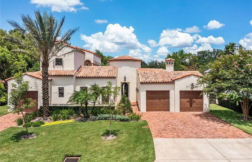 Discover the pure enjoyment of a Renaissance home handcrafted by artisans and nestled along the edges of Lake Down, one of the largest of the Butler Chain of Lakes, in the very quaint Town of Windermere. Although fairly recently built, this custom "old world style" will captivate your spirit as you step through the rotunda main entrance! You will marvel at the gorgeous fountain-courtyard with impressive water features that will elevate your senses to a new level of escapism! Completely entrancing, this masterpiece exudes attention to detail beyond this time in place. As you gaze at the courtyard you are drawn to the back of the home where lies an expanse of lush green grass leading to the covered dock, ski boat and lake and all the excitement that awaits you! Tucked discreetly into a wide canal just three homes from the broad open mouth of Lake Down, you are seconds away from the pristine waters of this famed fishing, skiing and water sports mecca! This highly desirable real estate, embodied in the authentic Mediterranean architectural style, is a splendid first class package offered on a homesite nearly 1/2 acre in size enjoying 200 linear feet of waterfront beauty. It is a sanctuary from the real world -- a true escape to your dream life in your dream home. The floor plan is arranged to offer different spaces for different activities designed brilliantly to allow for privacy and functionality. True courtyard style home with a pool-fountain-spa as the centerpiece can be enjoyed from every angle of this estate. With two main floor wings, you will find the lavish primary bedroom retreat on the right hand side as well as a large private office, a separate living room/sitting parlor with fireplace that adjoins to a small alcove opening to private outdoor patio. ;Water: City