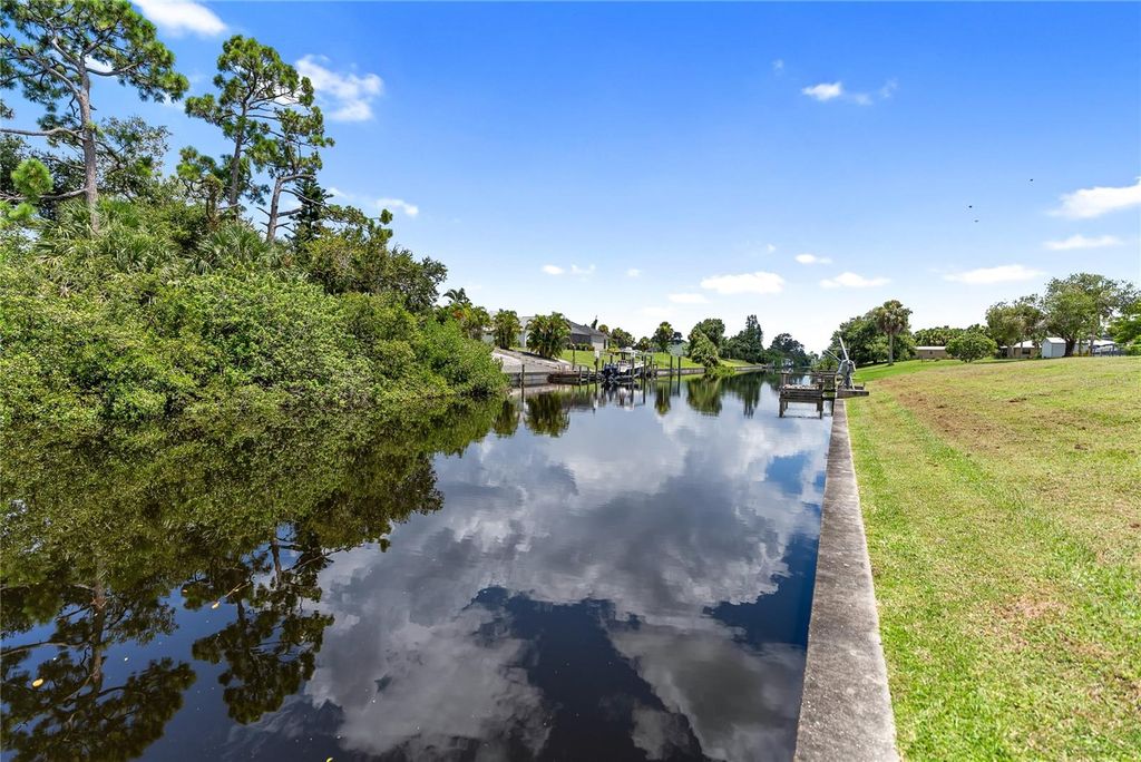 Photo of 2128 Pellam Boulevard, Port Charlotte, FL 33948 (MLS # A4662354)