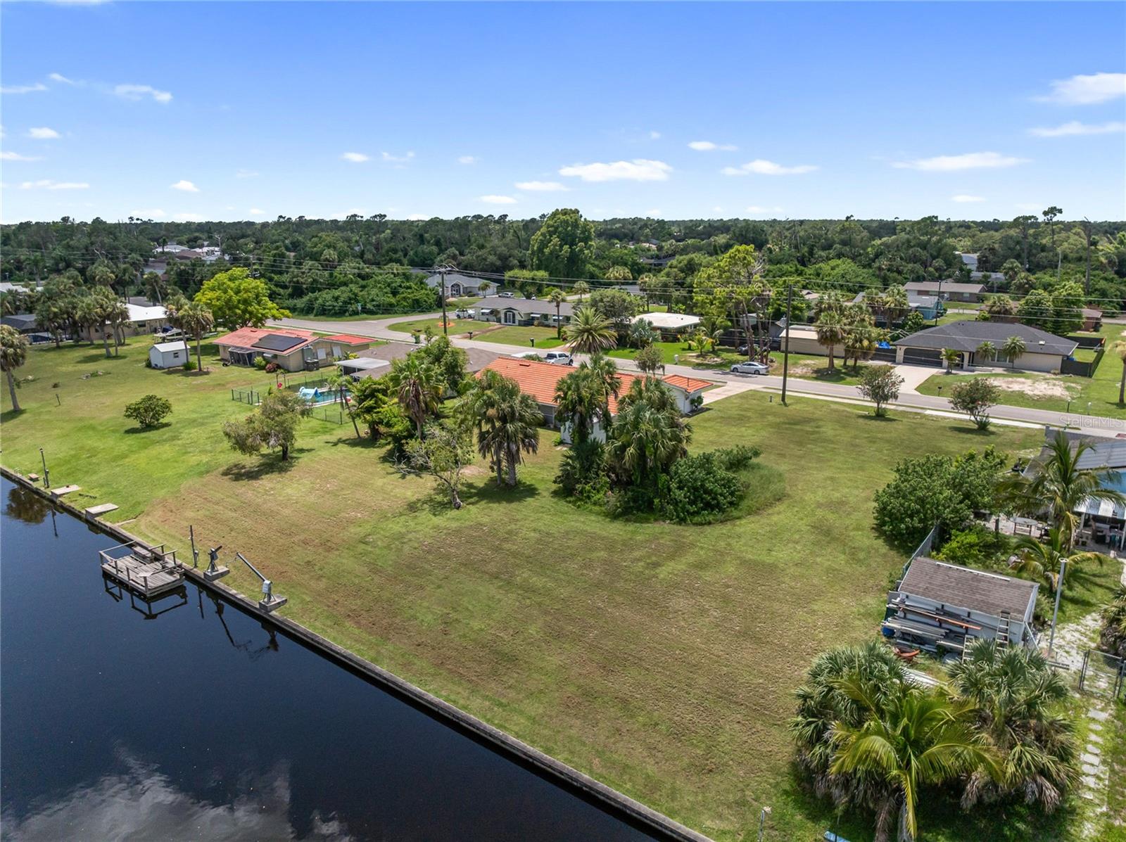FANTASTIC CLEARED VACANT LOT ON A CANAL WITH CONCRETE SEAWALL WITH ACCESS TO CHARLOTTE HARBOR. ONLY 2 FIXED BIRDGES. NO FLOOD ZONE. NO HOA.PELLAM WATERWAY. ADJACENT RESEIDENTIAL SINGLE FAMILY HOME AVAILABLE TO BE SOLD WITH IT. SEE MLS ID: A4660154