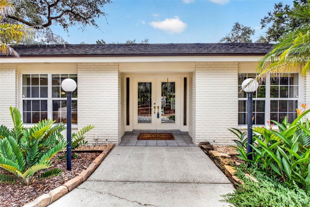 Photo of 513 Garrard Drive, Temple Terrace, FL 33617 (MLS # TB8548842)