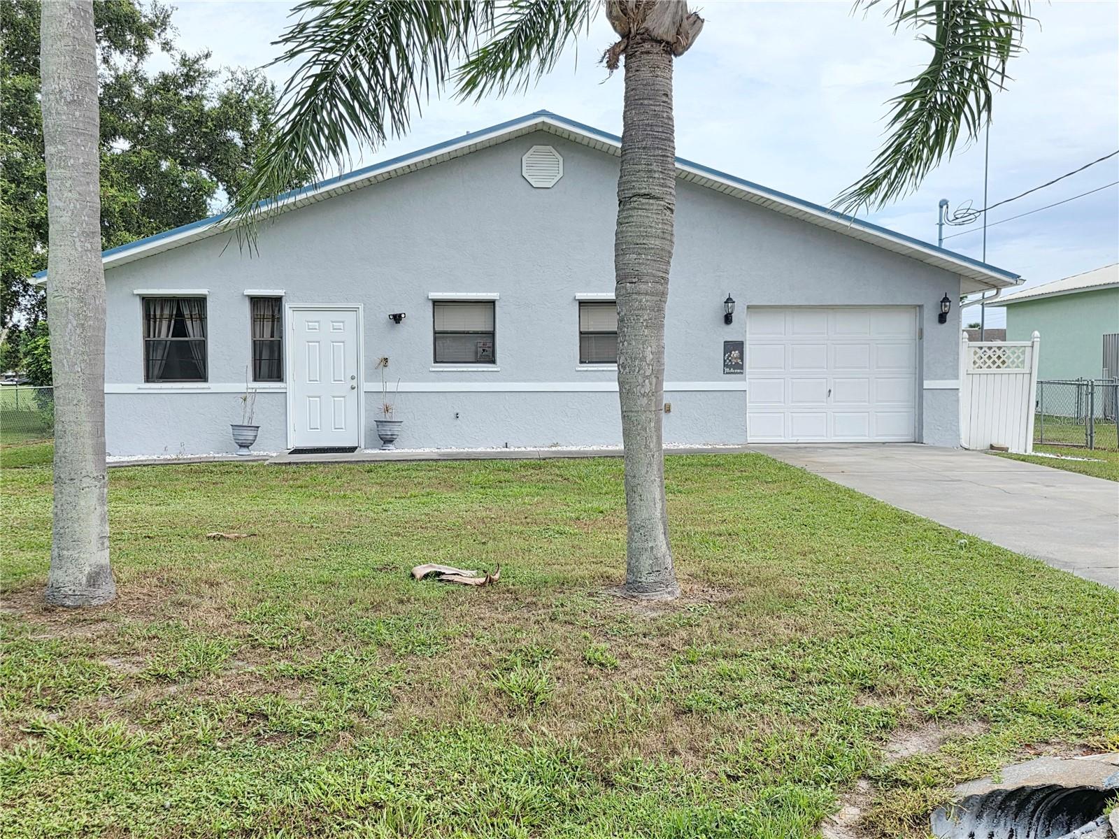 LAKE OKEECHOBEE ACCESS – DIRECT TO EITHER COAST
Beautiful 2/2 CBS turnkey home with outstanding water views and easy access to the Rim Canal, just minutes from the locks.
This property features:
Two master suites with updated bathrooms
Granite countertops in the kitchen
New metal roof (2020) and hurricane shutters
Safe room with concrete-filled, rebar-reinforced walls
New seawall and survey on file
Lanai access from both the primary bedroom and living room, overlooking the water
Office space ideal for working from home
Fenced backyard with automatic irrigation system
Enjoy relaxing mornings and evenings watching the water from your living room or kitchen. This home truly combines comfort, safety, and the perfect waterfront lifestyle.