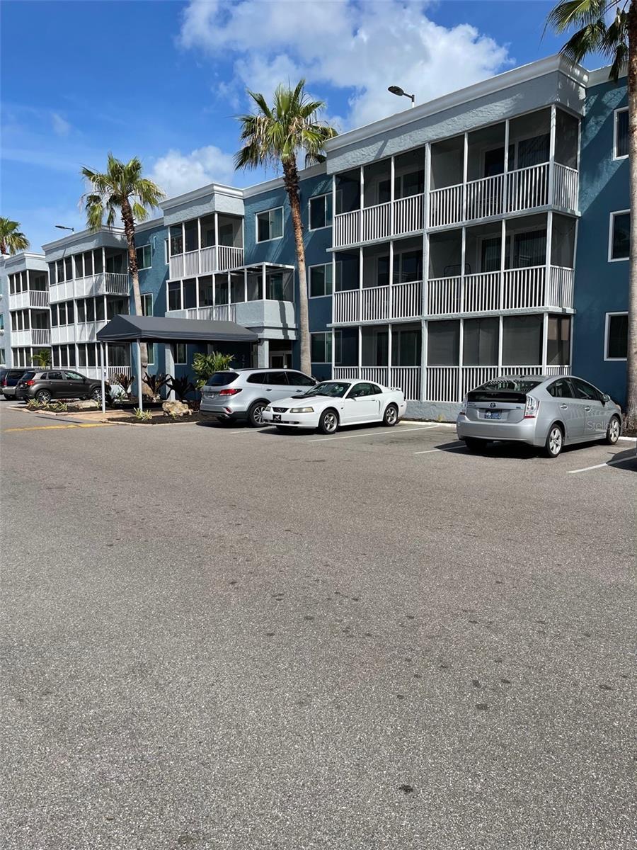 Lovely condo on first floor in the gated community of Sarasota Palms. Open kitchen with stainless steel appliances. Living/Dining area combo with sliding glass doors to screened lanai. Impact windows. Walk-in closet in bedroom, extra closet in hallway. All tile in kitchen and great room; beautiful new laminate flooring in bedroom. Electric Vehicle charging stations. Tennis courts, play ground, huge pool, picnic area, and a fenced dog run. Inside the clubhouse you'll find a well equipped fitness center, business office, billiards room, theater, and gathering room with kitchen which can be rented for birthday parties. Conveniently located just a few miles to downtown Sarasota, St Armands Circle and Lido Beach. Beautiful living!