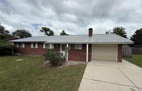 Photo of 1225 Victory Palm Drive, Edgewater, FL 32132 (MLS # NS1089528)